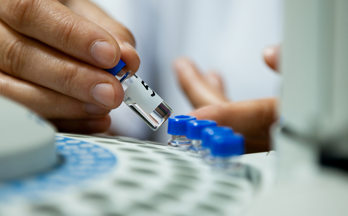 Scientist preparing a sample for cancer therapy treatment, crucial in the BeOne Pipeline for effective cancer care.